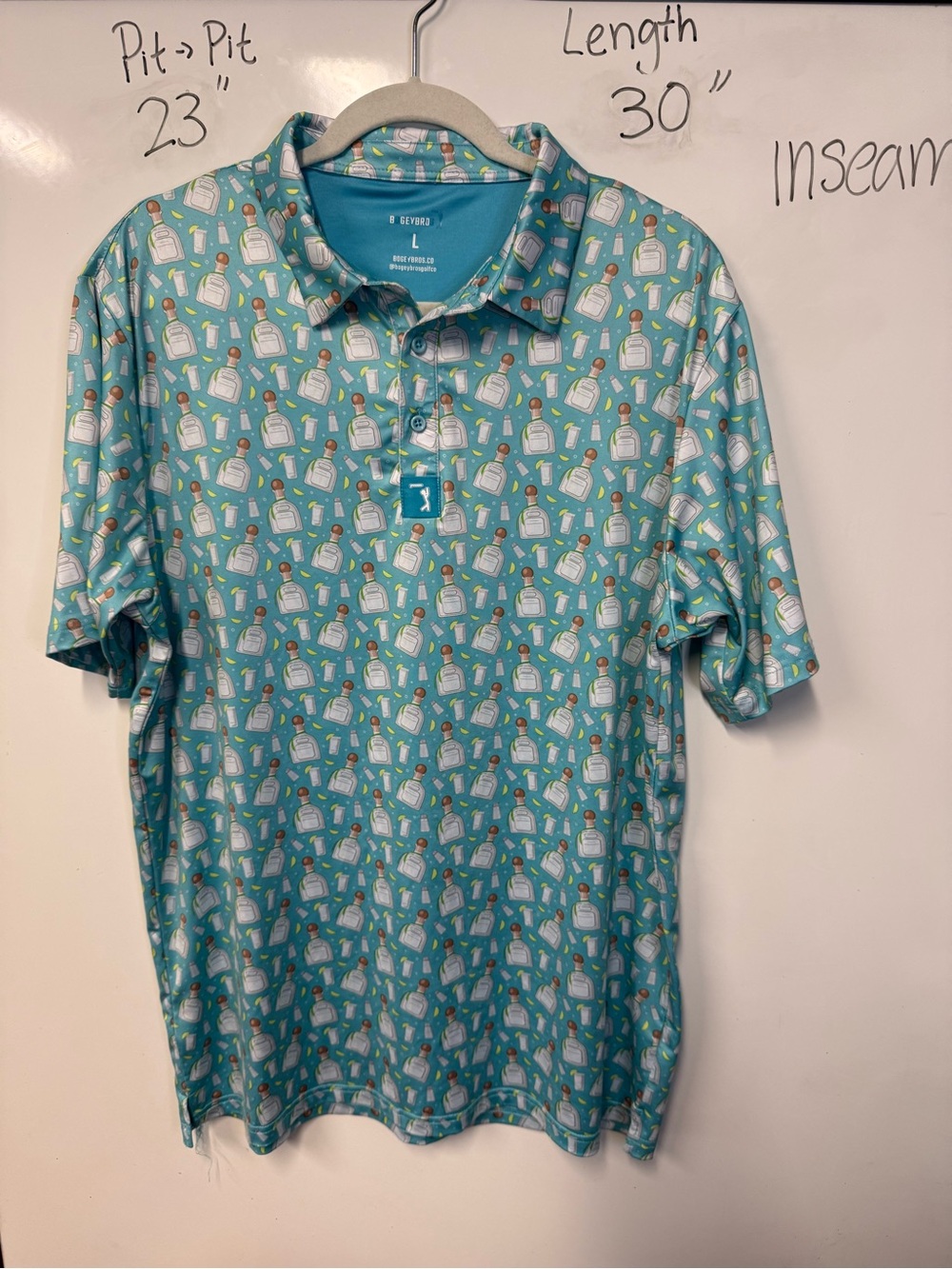 B. Draddy Teal Printed Polo Shirt
